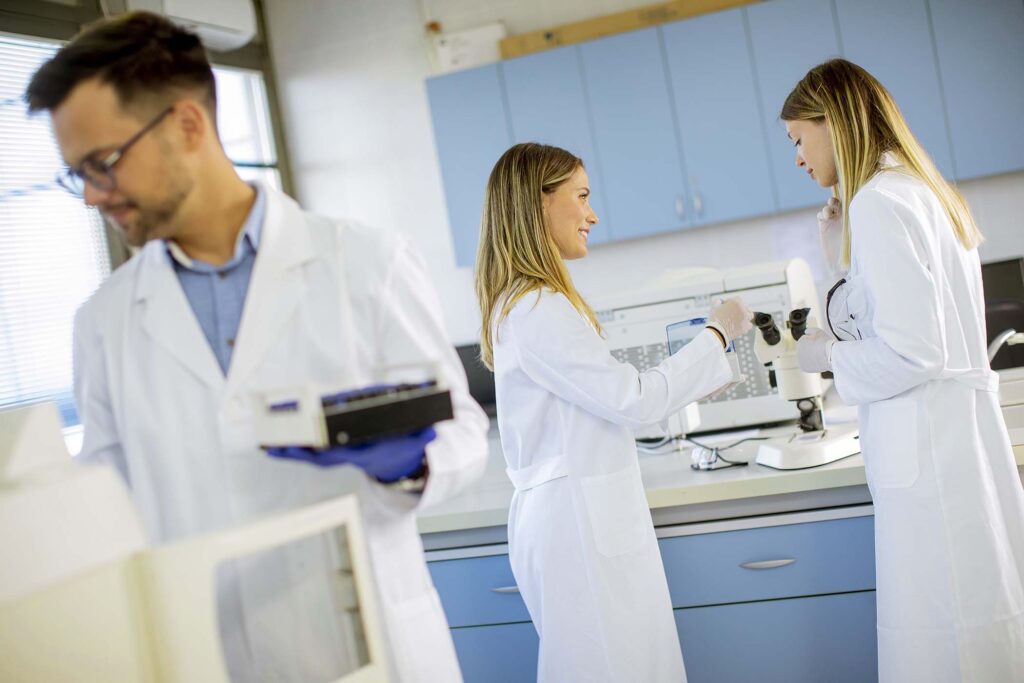 researcher-in-protective-workwear-standing-in-the-BM8K3R7.jpg